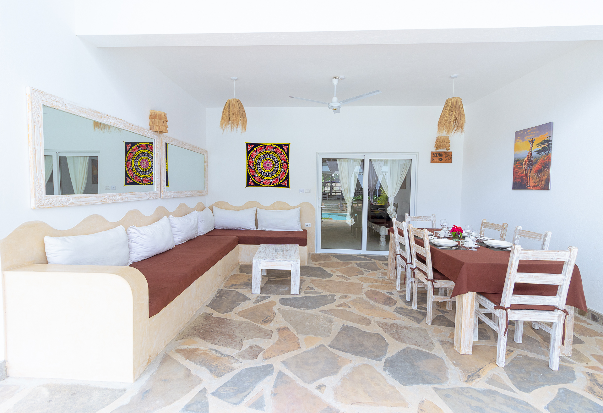 Open-air living and dining area with hand-crafted furniture