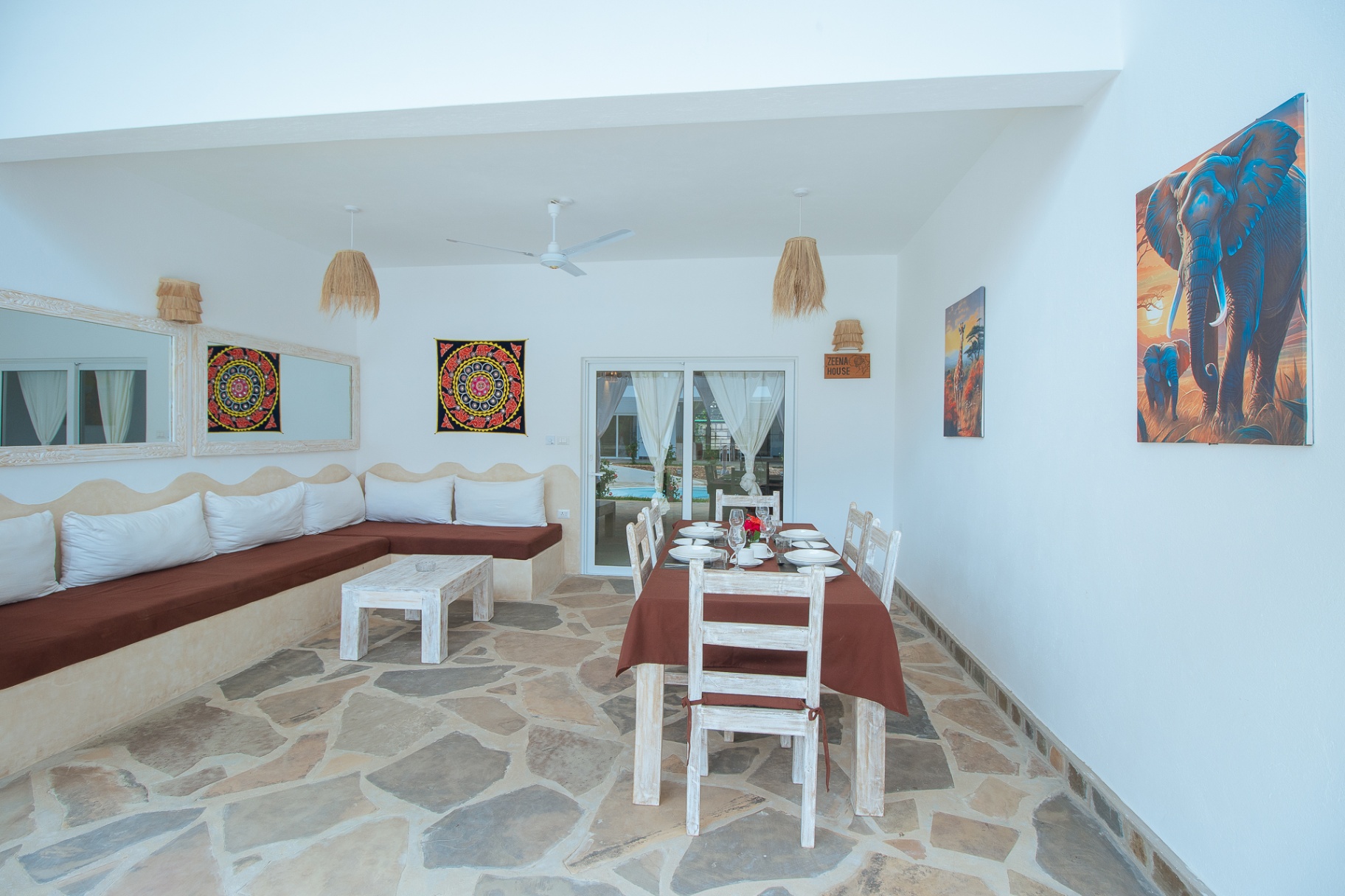 Lounge area with warm artwork and seating