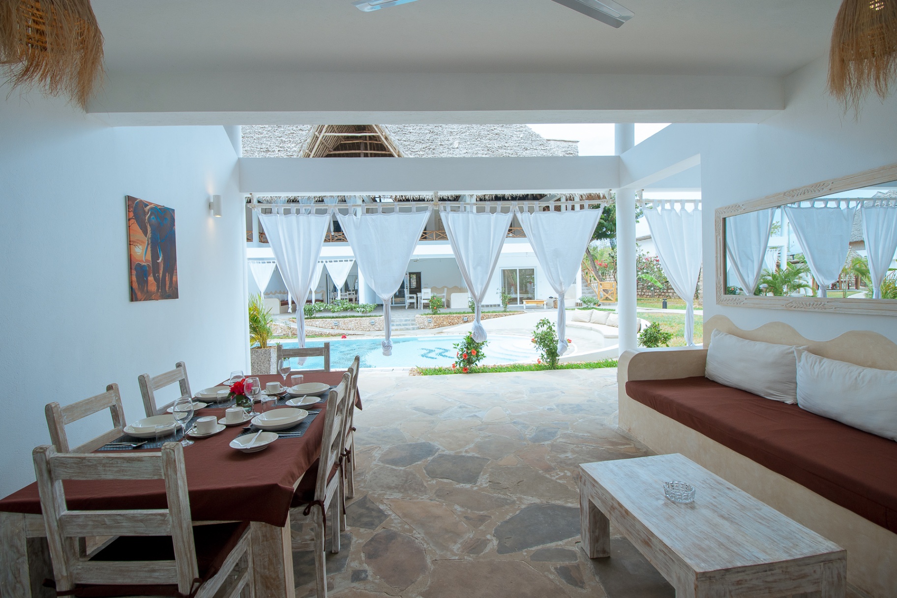 Shaded veranda overlooking the pool